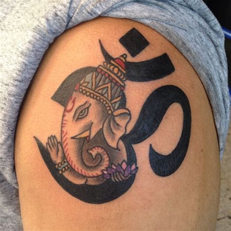 "OM and Ganesh" fusion tattoo