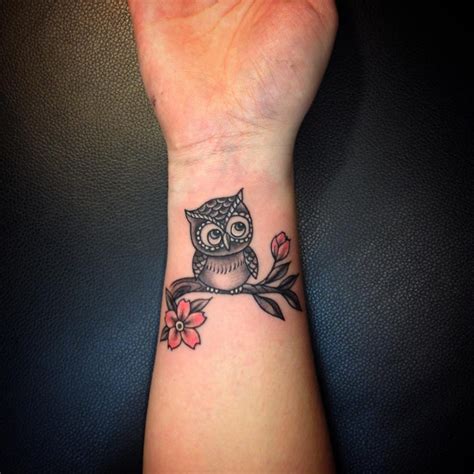 Owl tattoo on wrist Owl tattoo, Tattoos, Skull tattoo