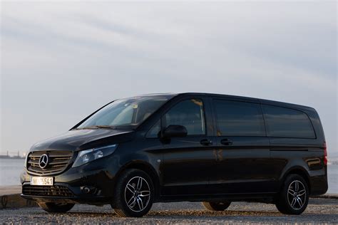 Passengers in transfer van