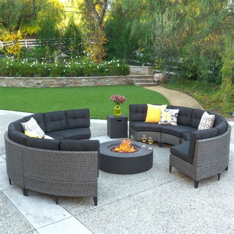 Predmore Beige and Brown Round Fire Pit Outdoor Dining Set from Ashley Coleman Furniture