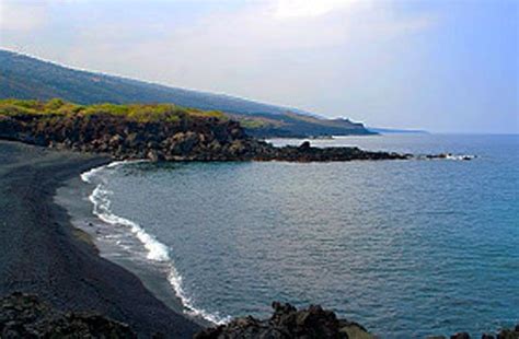 Black Pebble Beach on the Big Island of Hawaii Stock Image - Image of
