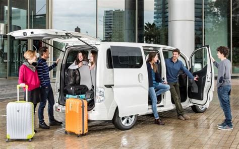 People Getting into a Mini Van