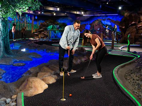 People Playing Mini Golf