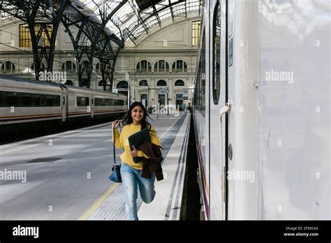 People Running To Catch Train