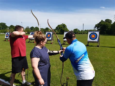 People doing archery