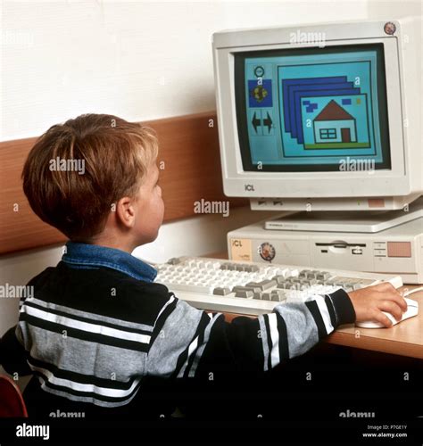 People using computers in the 90s