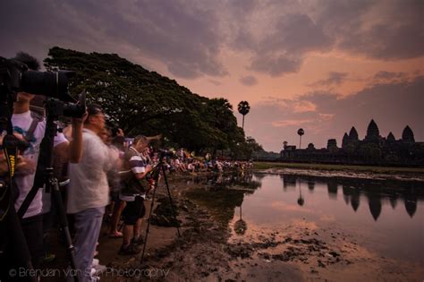 Person taking photo of Angkor Wat