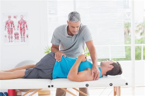 Physical Therapist Treating Back Pain