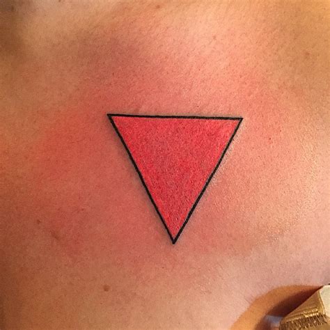 Pink triangle on top of my arm 7rl sticknpokes
