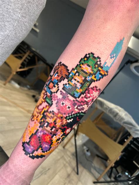 Pixel Perfect: Discover the Art of Pixel Tattooing with Our Talented Tattoo Artist!