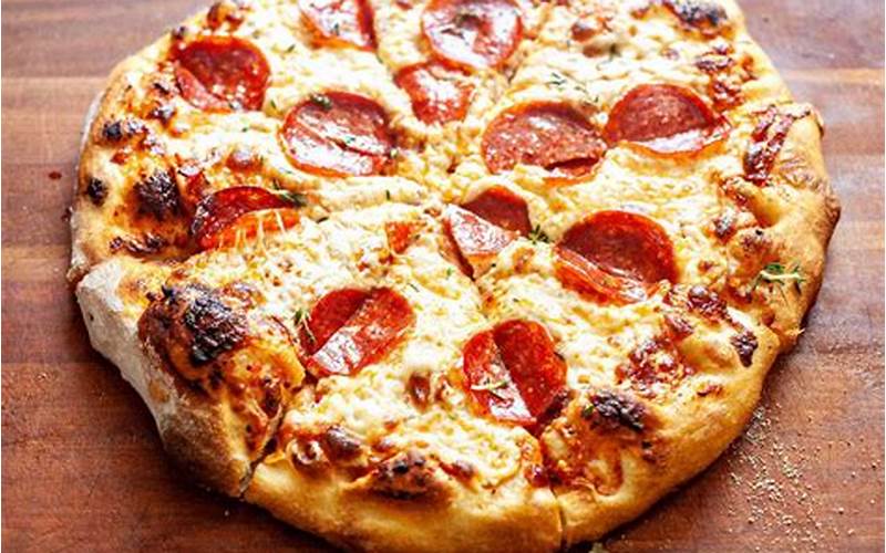 What is the Minimum Hot Holding Temperature for Pizza?