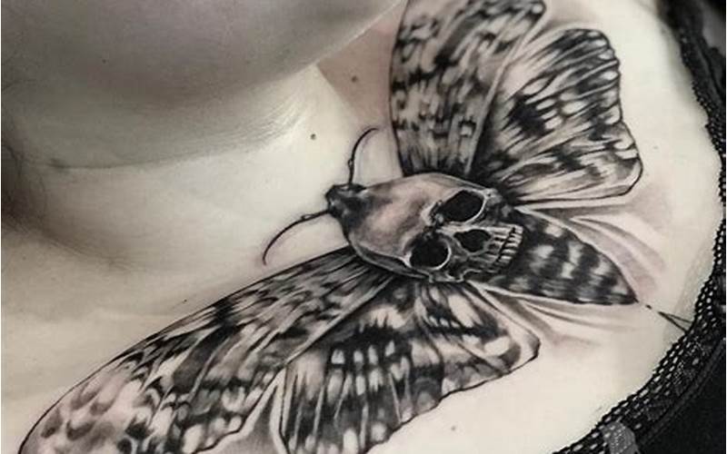 Placement Of Death Moth Neck Tattoo