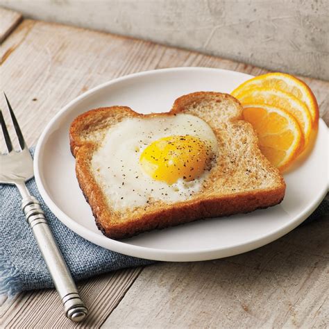 Plate of sunny side up eggs with toast