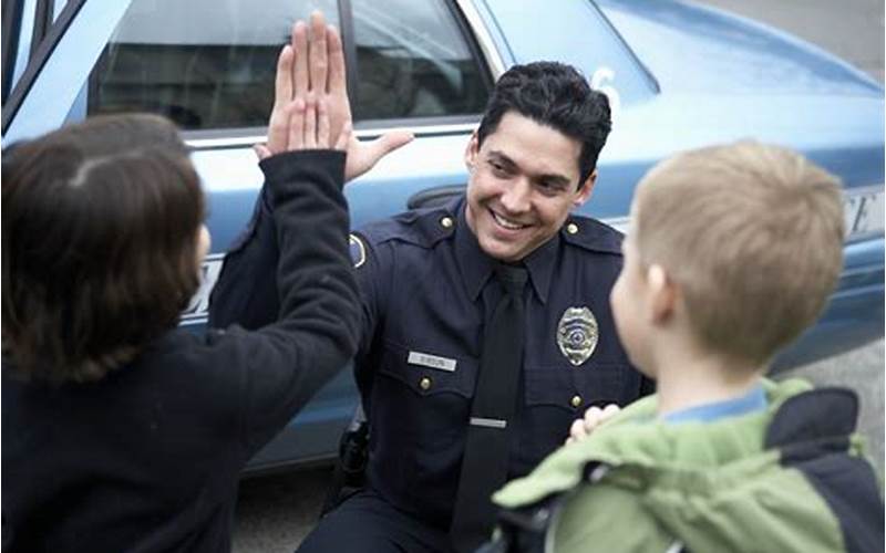 Police Officer Helping Child