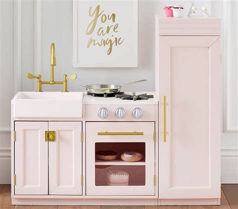 Discover the Magic of Imaginative Play: Unleash the Creativity with Pottery Barn's Pre-Loved Play Kitchen!
