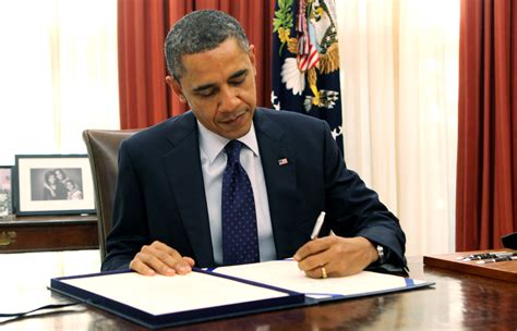 President signing a bill