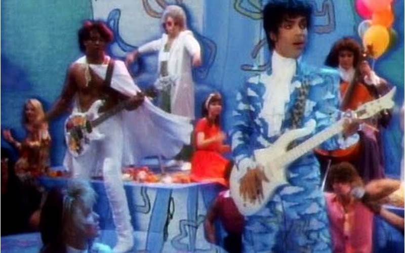 Prince Playing Guitar In Raspberry Beret