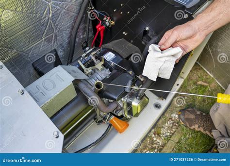 Professional Generator Technician Checking a Generator
