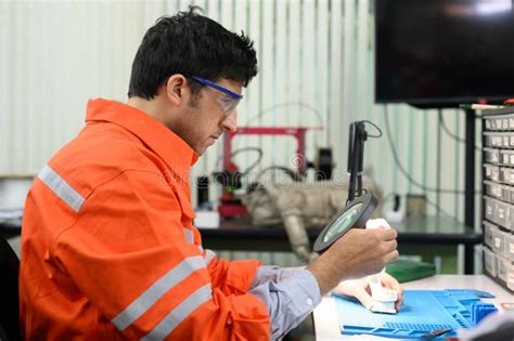 Professional Repair Technician Checking a Device