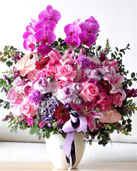 Purple Orchids In Vase