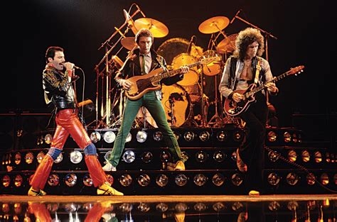 Queen performing on stage