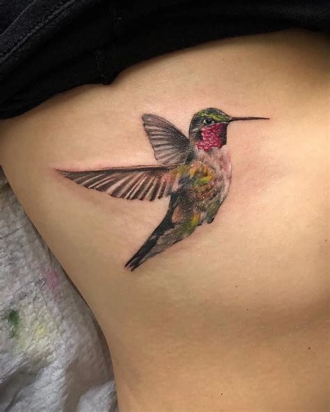 Realistic Hummingbird Tattoo On Back Tattoo Designs