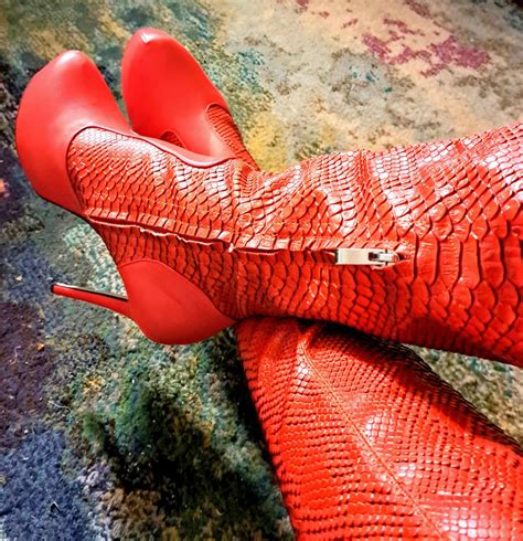 Step into Style with Red Snake Skin Boots: Shop Now!