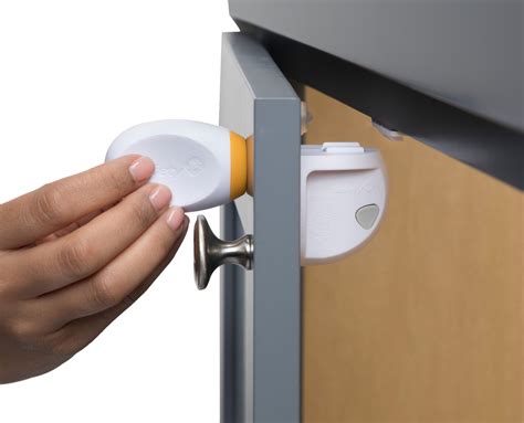 Removing a Safety 1st door lock adhesive backing