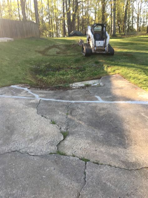 Repairing Small Sinkholes in the Driveway
