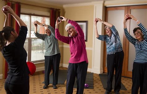 Residents engaged in a group activity at Currituck Health and Rehab