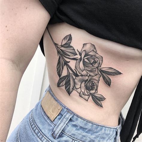 Double rose tattoo on the rib cage Rose rib tattoos