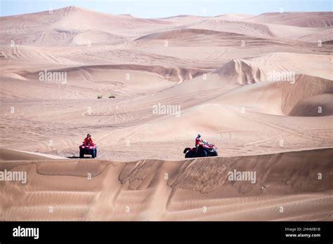 Riding ATV Desert Dunes