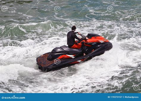 Riding Jetski Waves