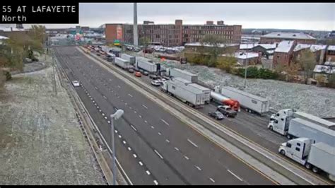 Checking road surface conditions with traffic cameras