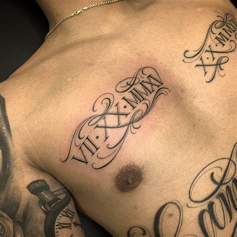 Roman Numeral Tattoo On Chest