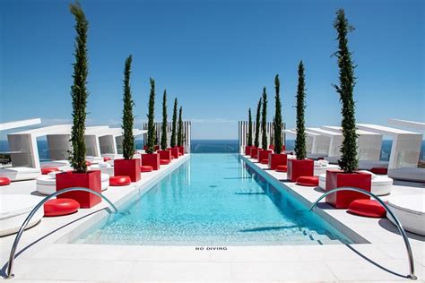 Roof top infinity pool at higeuron hotel Malaga by Hilton