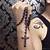 Rosary Beads Tattoo Designs For Men