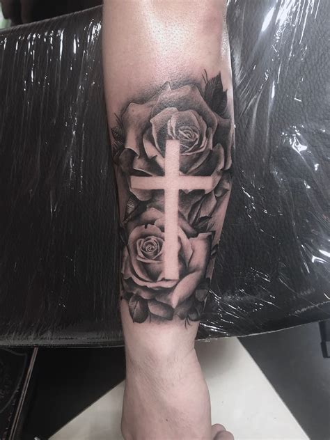 Cross with roses Tattoo done by me Chop Shop Tattoos