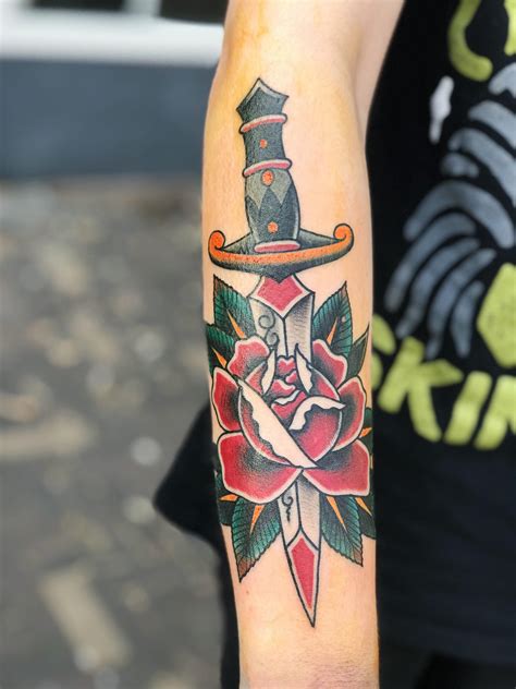 Top 69 Best Rose and Dagger Tattoo Ideas [2021
