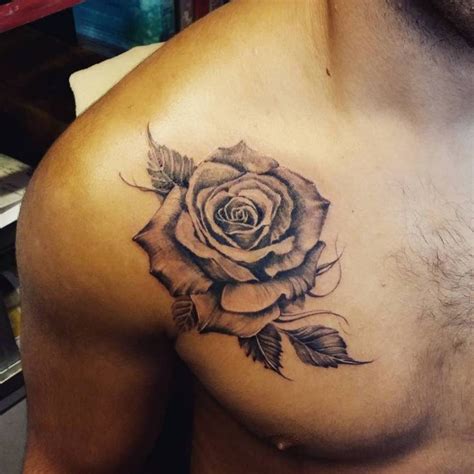 Ashton Beebe Black and grey rose tattoo. Rose chest