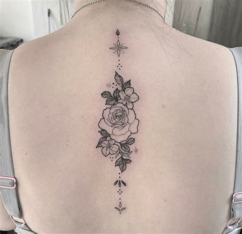 Rose Spine Tattoo