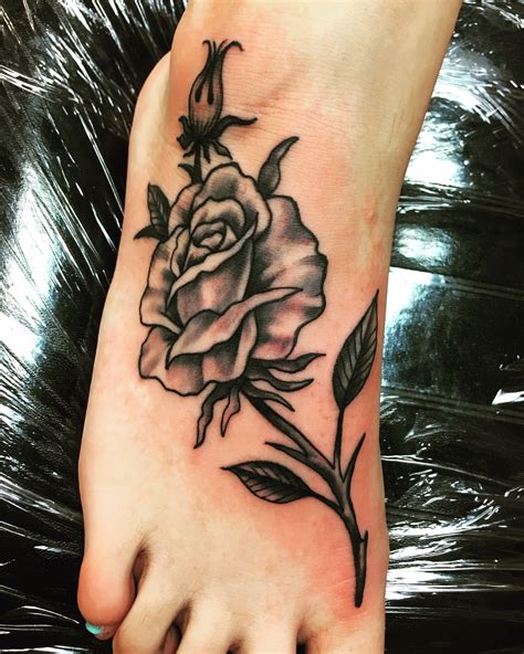 My black and grey rose cover up foot tattoo Tattoos for