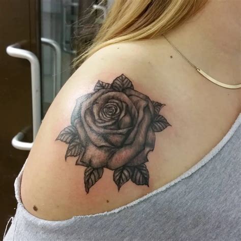 Rose shoulder tattoo in black & shading 