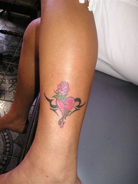 Lisa Parr / heart shaped rose tattoo heart rose pink 