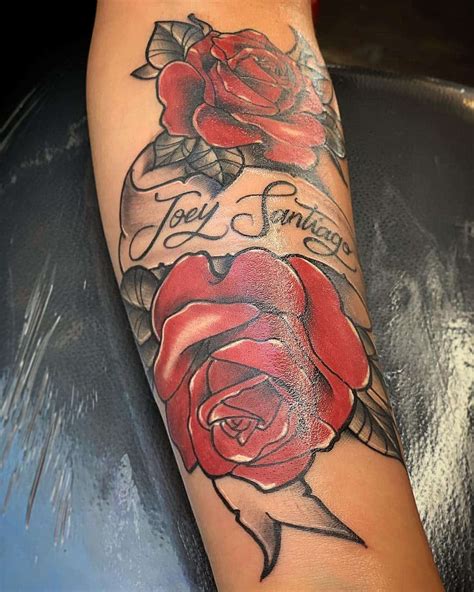 Rose with name tattoo. Tattooed by Cuong Tatt (With