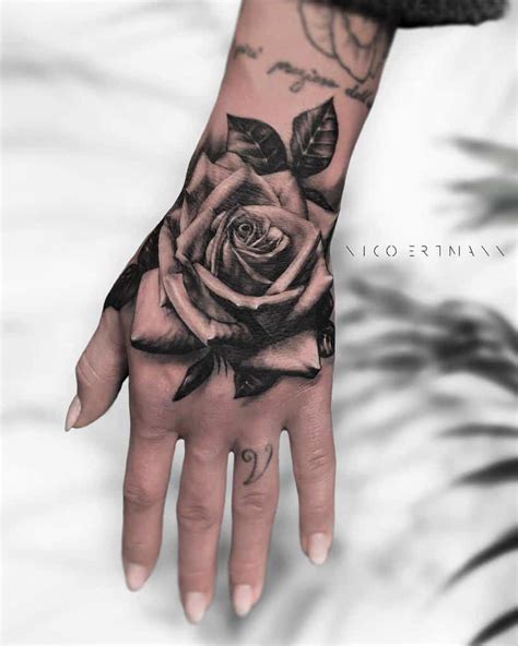 Roses On Hand Tattoo