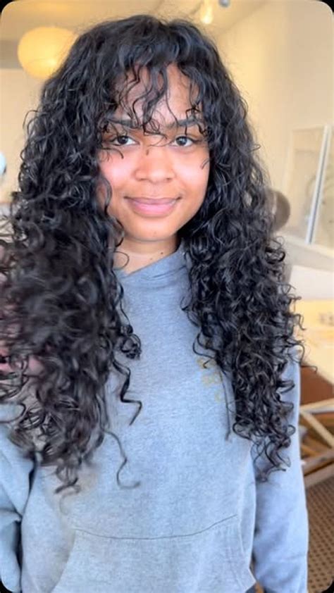 Round Faces: Adding Angles with a Curly Fringe