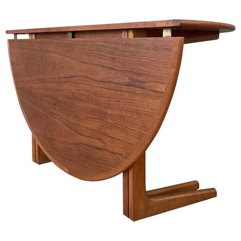 Round drop leaf dining room table