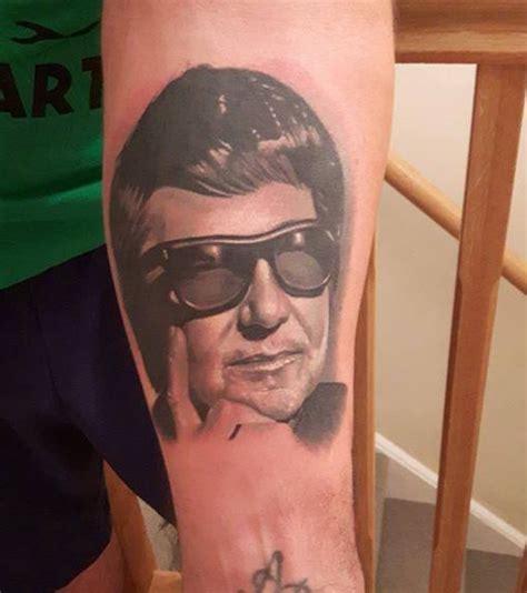 Here's a great Roy Orbison arm tattoo! Arm tattoo