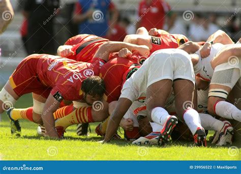 Rugby players scrumming